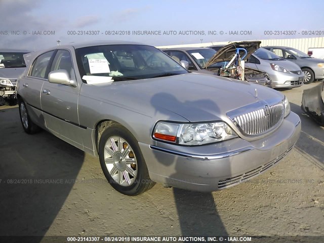 2LNBL8CV6BX752422 - 2011 LINCOLN TOWN CAR SIGNATURE LIMITED SILVER photo 1