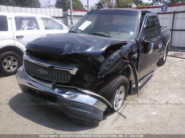 1FTRX07W9XKA02308 - 1999 FORD F150 Синий фото 6