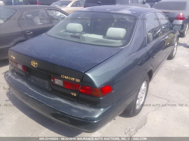 JT2BF22K4V0013710 - 1997 TOYOTA CAMRY LE/XLE GREEN photo 4