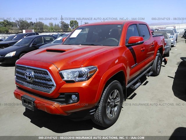 3TMAZ5CN3HM051760 - 2017 TOYOTA TACOMA DBL CAB/SR5/TRD SPORT/OR ORANGE photo 2