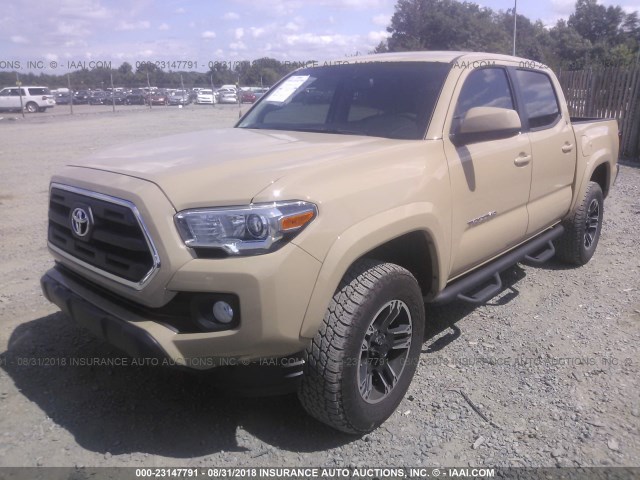 5TFAZ5CN9HX022810 - 2017 TOYOTA TACOMA DBL CAB/SR5/TRD SPORT/OR BROWN photo 2