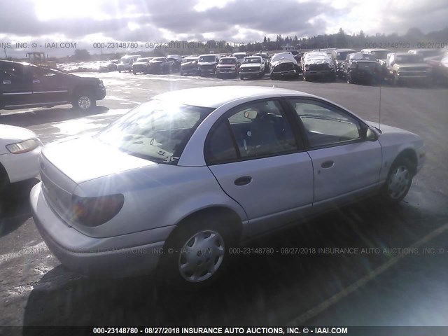 1G8ZH52882Z137969 - 2002 SATURN SL1 SILVER photo 4