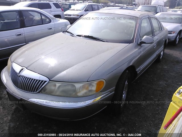 1LNHM97V2YY925241 - 2000 LINCOLN CONTINENTAL  Silber Foto 2