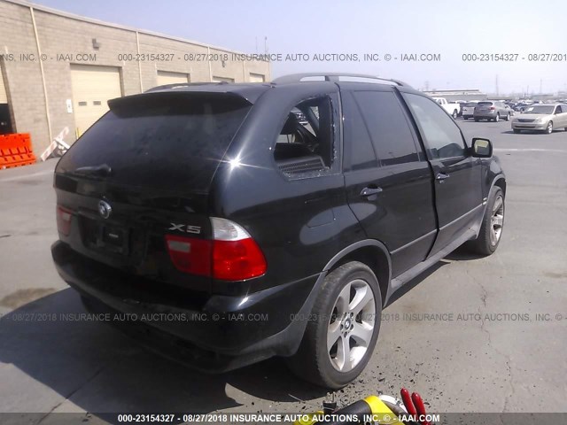 WBAFB33531LH06389 - 2001 BMW X5 4.4I BLACK photo 4