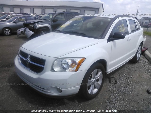 1B3CB3HA5BD296104 - 2011 DODGE CALIBER MAINSTREET WHITE photo 2