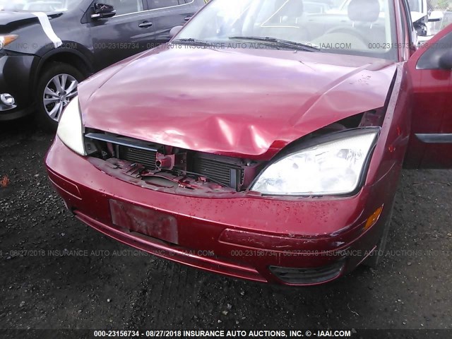 1FAFP34N25W271410 - 2005 FORD FOCUS ZX4 RED photo 6
