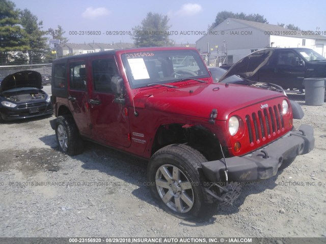 1J4BA3H18AL137962 - 2010 JEEP WRANGLER UNLIMITE SPORT RED photo 1