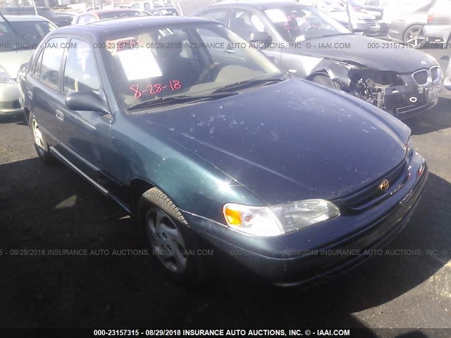 1NXBR12EXXZ166764 - 1999 TOYOTA COROLLA VE/CE/LE 绿色 照片 1