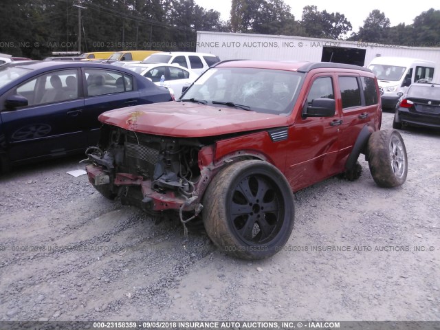 1D8GU58647W626345 - 2007 DODGE NITRO R/T ORANGE photo 2