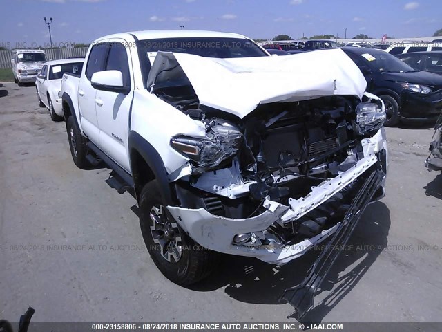 5TFCZ5ANXHX087273 - 2017 TOYOTA TACOMA DBL CAB/SR/TRDSPT/OR/PRO WHITE photo 1