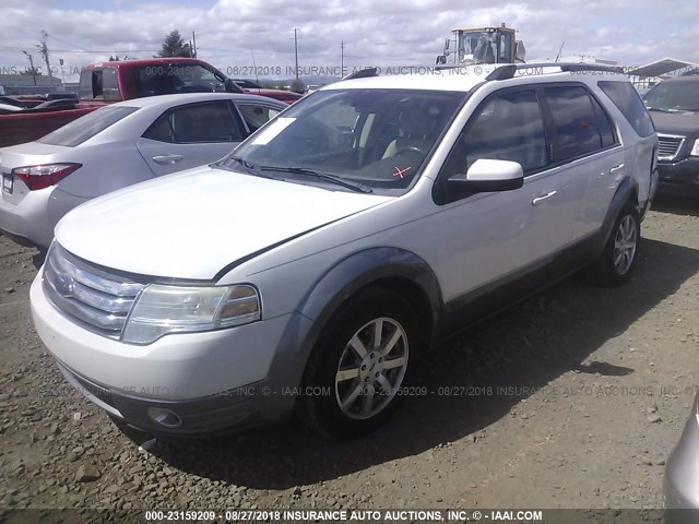 1FMDK05W29GA01028 - 2009 FORD TAURUS X SEL WHITE photo 2