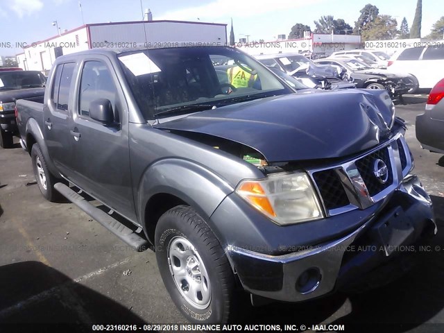 1N6AD07U57C410784 - 2007 NISSAN FRONTIER CREW CAB LE/SE/OFF ROAD GRAY photo 1