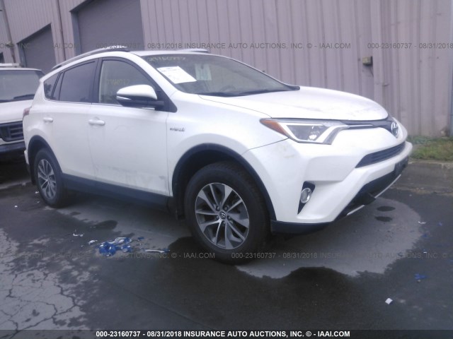 JTMRJREV8GD030671 - 2016 TOYOTA RAV4 HV XLE WHITE photo 1