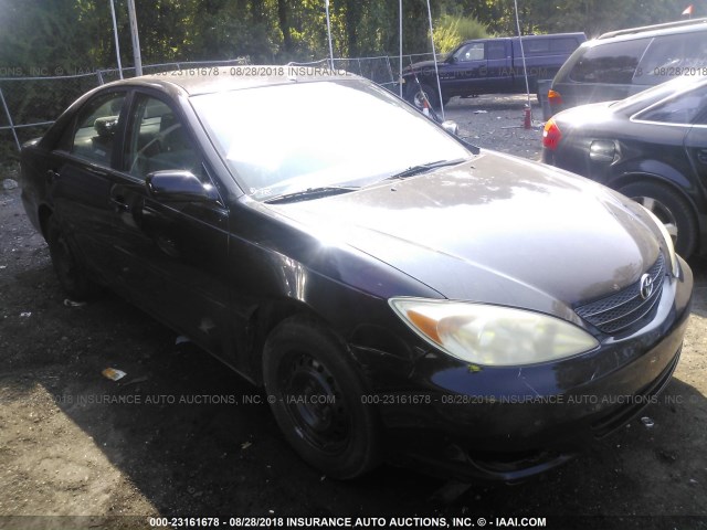 JTDBE32K220135459 - 2002 TOYOTA CAMRY LE/XLE/SE 黑色 照片 1