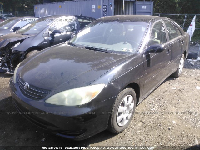 JTDBE32K220135459 - 2002 TOYOTA CAMRY LE/XLE/SE 黑色 照片 2