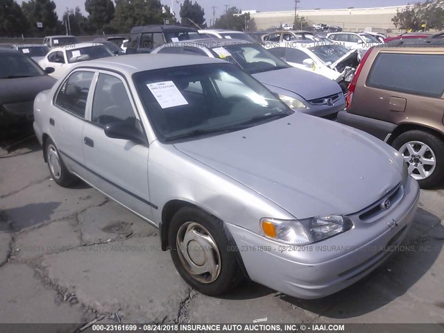 1NXBR12E8XZ275871 - 1999 TOYOTA COROLLA VE/CE/LE SILVER photo 1