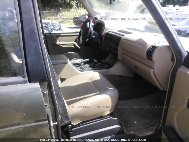 SALJY1240TA519205 - 1996 LAND ROVER DISCOVERY GRAY photo 4