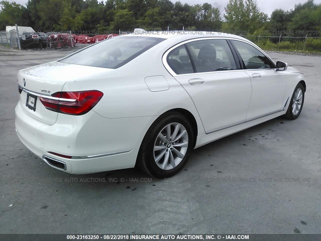 WBA7E4C55KGV28414 - 2019 BMW 740 XI WHITE photo 4