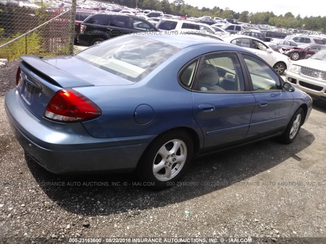 1FAFP53U34A121015 - 2004 FORD TAURUS BLUE photo 4