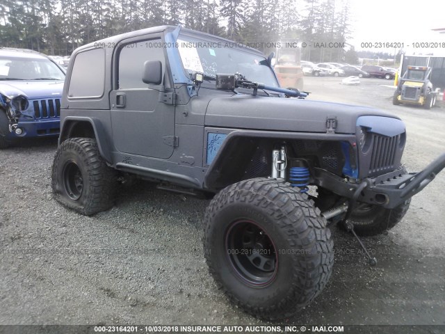 1J4FA49S52P766300 - 2002 JEEP WRANGLER / TJ SPORT BLACK photo 1