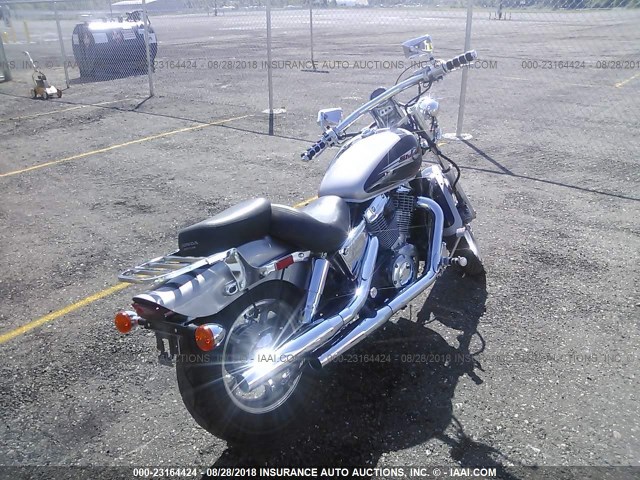 1HFSC1807YA403382 - 2000 HONDA VT1100 C SILVER photo 4