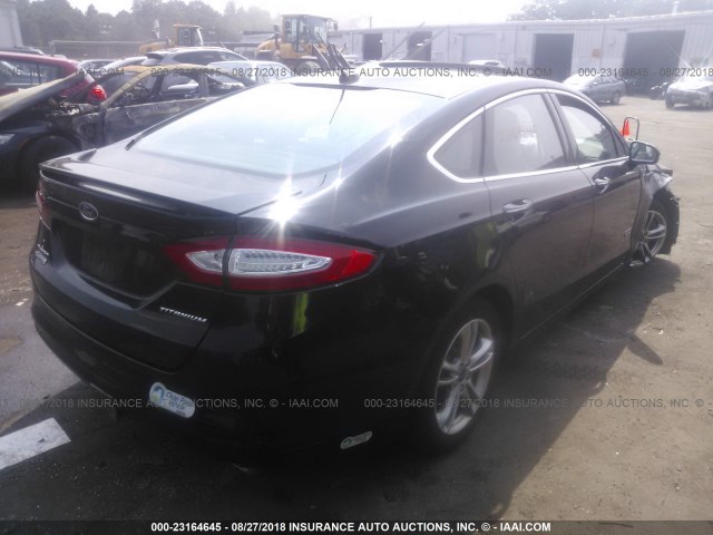 3FA6P0SU8GR294477 - 2016 FORD FUSION TITANIUM PHEV BLACK photo 4