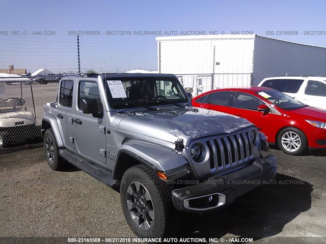 1C4HJXEG6JW228842 - 2018 JEEP WRANGLER UNLIMITE SAHARA SILVER photo 1