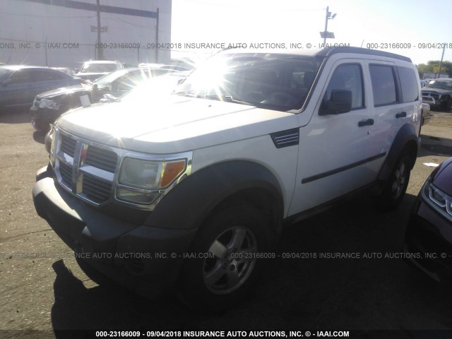 1D8GU28K47W556521 - 2007 DODGE NITRO SXT WHITE photo 2