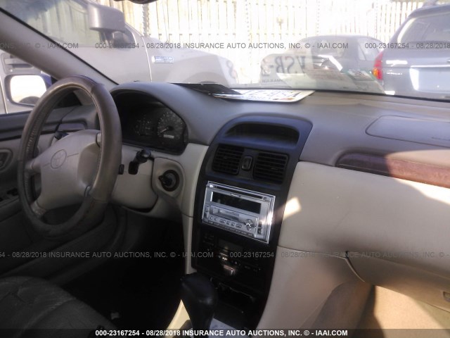 2T1CF28P5XC241478 - 1999 TOYOTA CAMRY SOLARA SE/SLE ლურჯი ფოტო 5