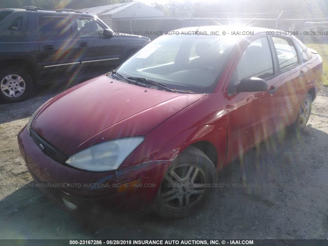 1FAFP3436YW375207 - 2000 FORD FOCUS SE/SE SPORT RED photo 2