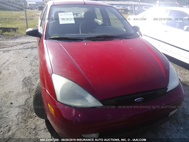 1FAFP3436YW375207 - 2000 FORD FOCUS SE/SE SPORT RED photo 6