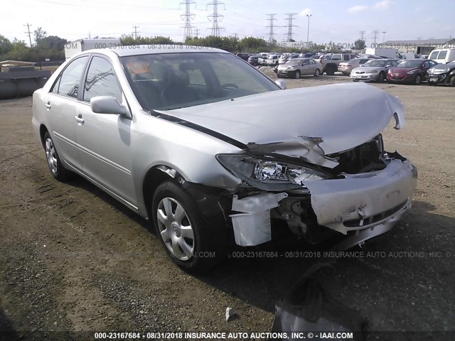 4T1BE32K24U274711 - 2004 TOYOTA CAMRY LE/XLE/SE SILVER photo 1