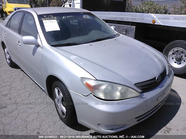 JTDBE32K730238040 - 2003 TOYOTA CAMRY LE/XLE SILVER photo 1