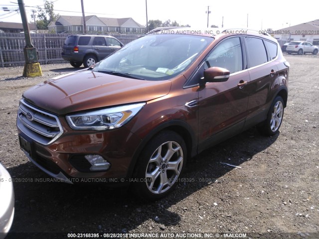 1FMCU9J90HUC45710 - 2017 FORD ESCAPE TITANIUM ORANGE photo 2