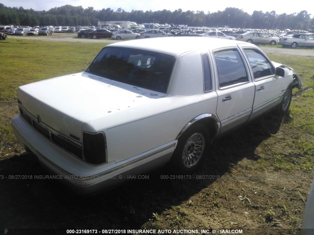 1LNLM81W8VY654557 - 1997 LINCOLN TOWN CAR EXECUTIVE Белый фото 4