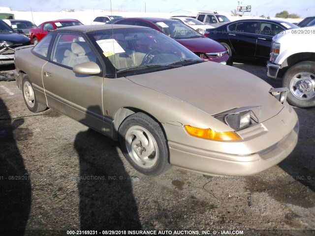 1G8ZG1578RZ219628 - 1994 SATURN SC2 GOLD photo 1