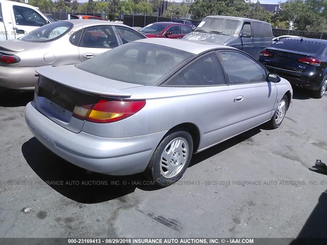 1G8ZY1270YZ129096 - 2000 SATURN SC2 SILVER photo 4