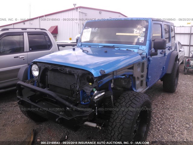 1C4BJWDG9FL740721 - 2015 JEEP WRANGLER UNLIMITE SPORT BLUE photo 2