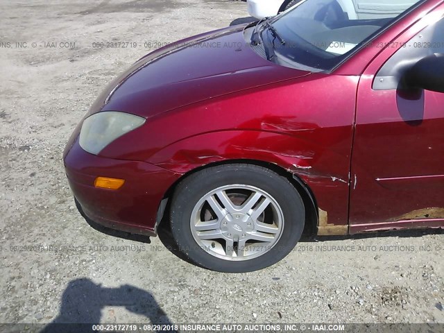 1FAFP34384W166948 - 2004 FORD FOCUS SE COMFORT/SE SPORT RED photo 6