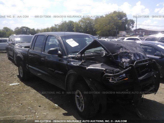 1B7GG2AN9YS785330 - 2000 DODGE DAKOTA QUAD BLACK photo 1