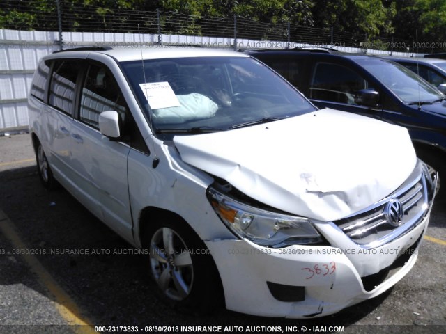 2V4RW3DG9BR659515 - 2011 VOLKSWAGEN ROUTAN SE WHITE photo 1