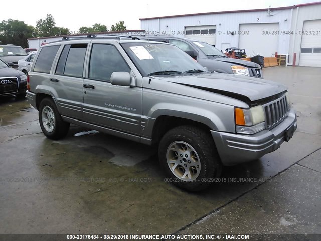 1J4GZ78S4WC307076 - 1998 JEEP GRAND CHEROKEE LIMITED SILVER photo 1