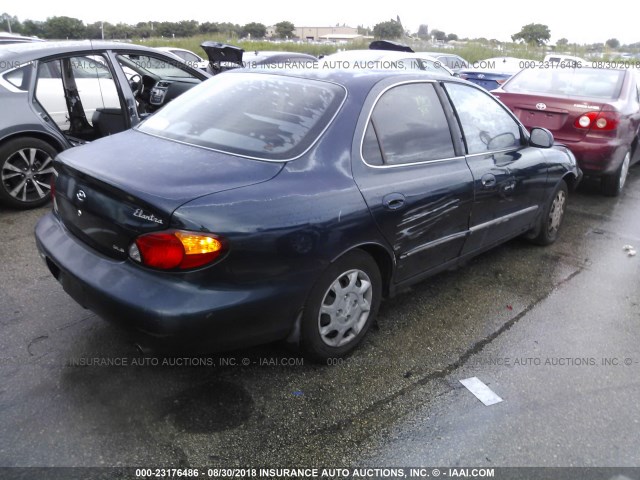 KMHJF35F3YU049873 - 2000 HYUNDAI ELANTRA GLS Navy photo 4