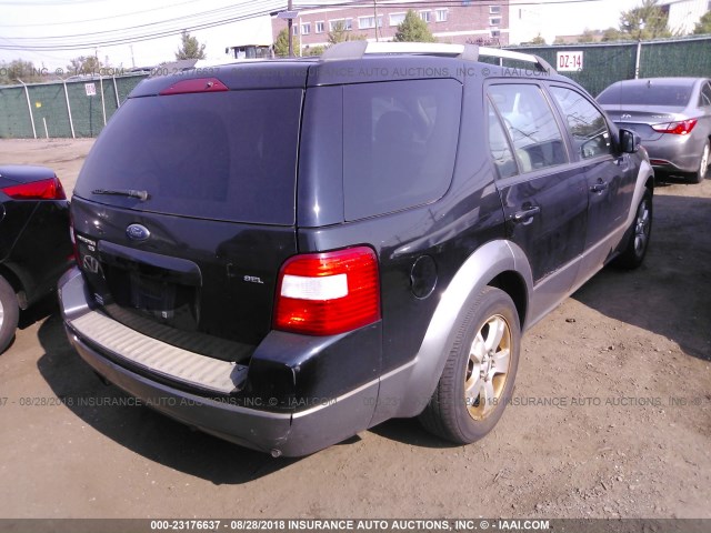 1FMDK05135GA37387 - 2005 FORD FREESTYLE SEL BLACK photo 4