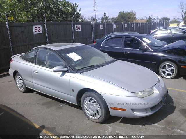 1G8ZR1279XZ355584 - 1999 SATURN SC2 GRAY photo 1