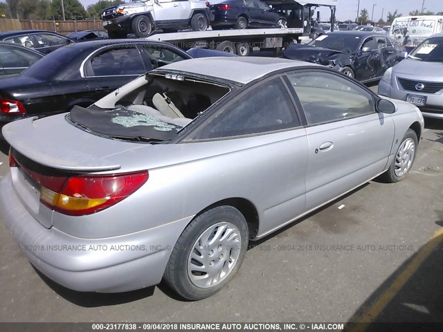 1G8ZR1279XZ355584 - 1999 SATURN SC2 GRAY photo 4