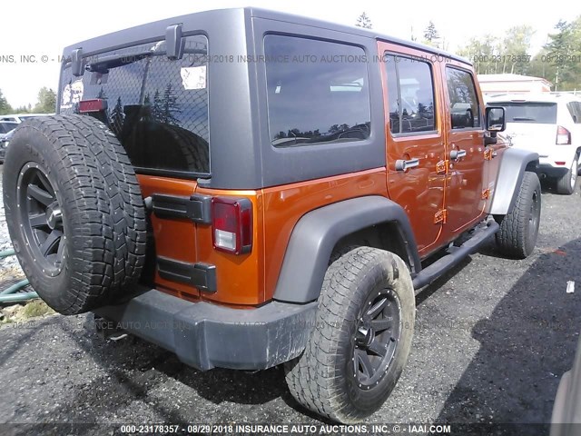 1J4BA3H13BL547523 - 2011 JEEP WRANGLER UNLIMITE SPORT ORANGE photo 4