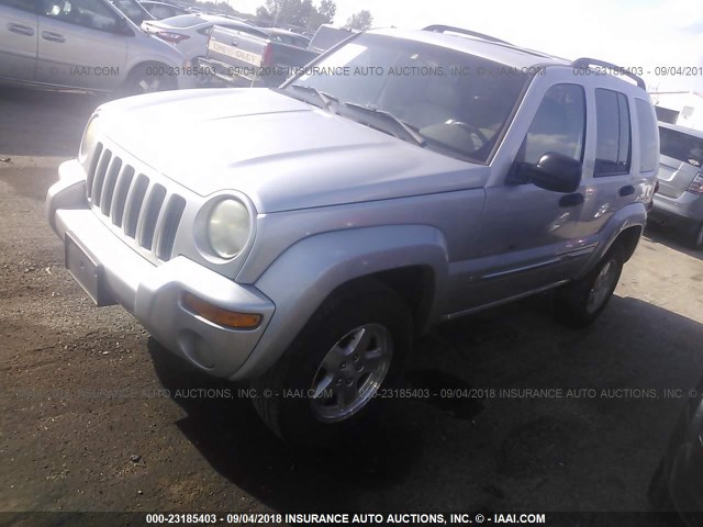 1J4GK58K92W285853 - 2002 JEEP LIBERTY LIMITED SILVER photo 2