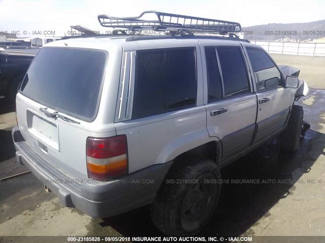 1J4GZ58S3VC537825 - 1997 JEEP GRAND CHEROKEE LAREDO/TSI GRAY photo 4