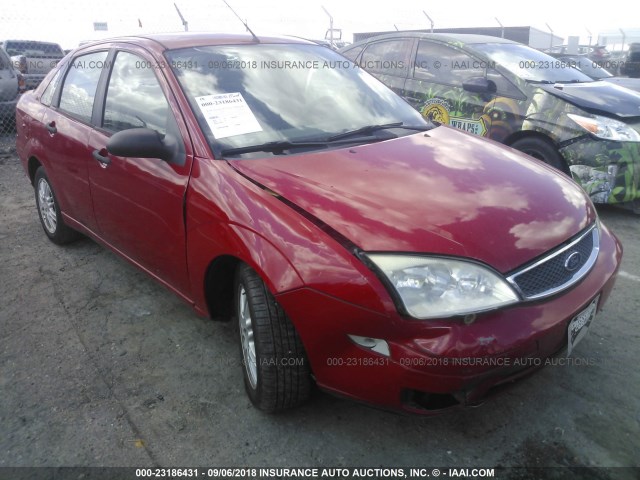 1FAFP34N05W199591 - 2005 FORD FOCUS ZX4 RED photo 1